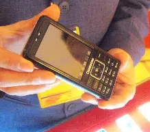 CUSTOM PHONES: Two specially developed handsets are used in the Cqpass system