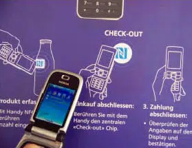 Farm produce buyers serve themselves with NFC phones in an unmanned shop