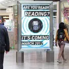 A poster site in Reading announcing the arrival of NFC advertising