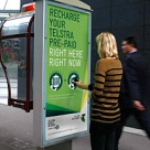 Telstra's NFC phone booth ad campaign in action
