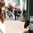 Tapping an NFC tag in Tokyo's Shibuya district