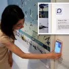 A visitor uses NFC to get information about an exhibit at the Savina Museum