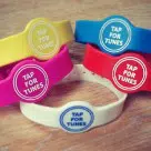 Wooshping's NFC wristbands