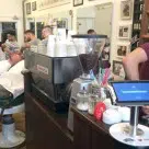 A Bitstraat Bitcoin POS terminal installed in an Amsterdam barber's shop