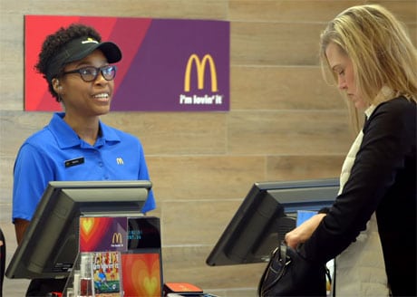 McDonalds staff will randomly select customers to perform a "lovin' act" to pay for their meal