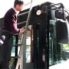 Onyx Beacon's CTO installs a Bluetooth beacon on a Bucharest trolleybus