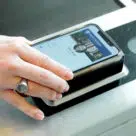 hand with smartphone scanning