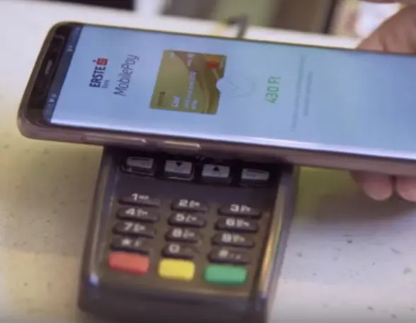 Phone being tapped on NFC reader