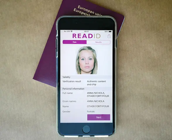 An iPhone reading a passport via NFC