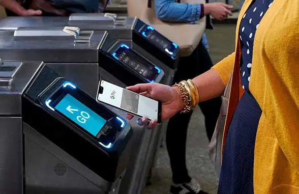 NFC smartphone being read by transit terminal