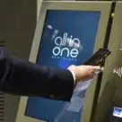 NFC smartphone being used at CaixaBank all in one terminal