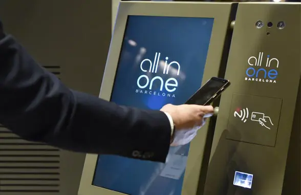 NFC smartphone being used at CaixaBank all in one terminal
