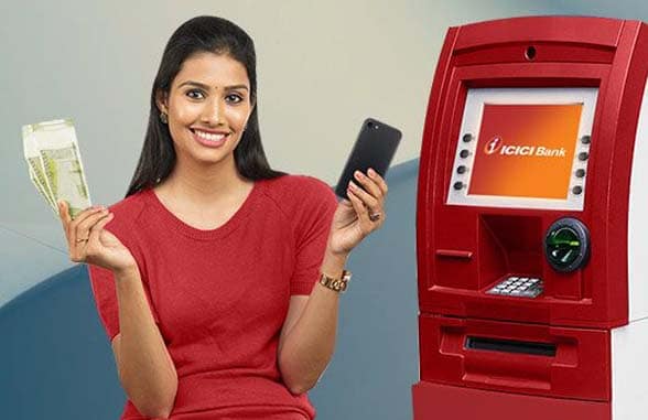 Woman demonstrating Icici Bank cardless ATM