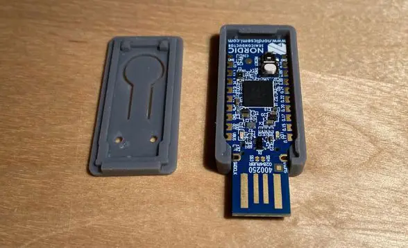A Nordic Semiconductor security key and its 3D-printed enclosure