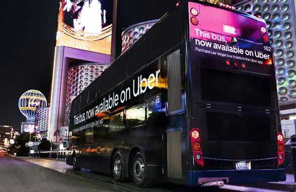 Night shot of Uber enabled RTC South Nevada bus in Las Vegas