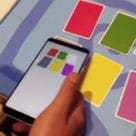 Smartphone tapping NFC enabled cards