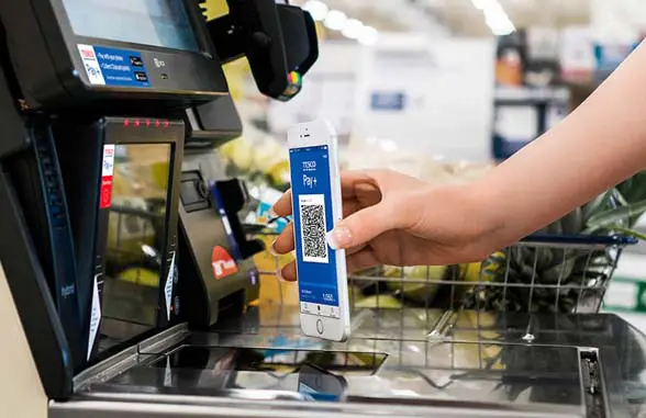 Tesco Pay+ app being used to pay for goods in Tesco Metro