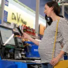 A customer transacts using Walmart Pay