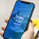 NFC smartphone showing Decathlon Scan & Go mobile self-checkout app