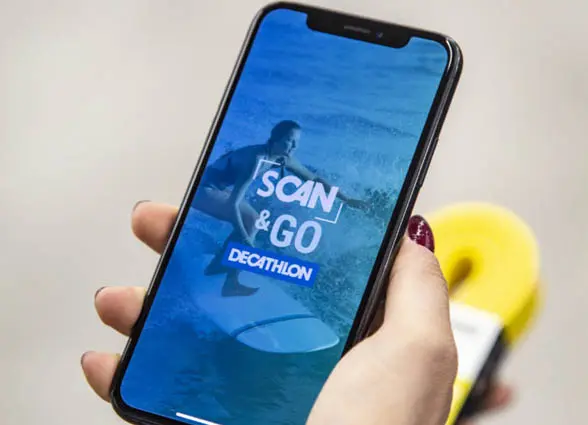 NFC smartphone showing Decathlon Scan & Go mobile self-checkout app
