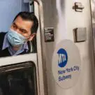 MTA New York man on subway with face mask