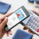 Edenred prepaid restaurant card with Apple Pay on smartphone and payment terminal