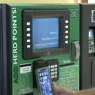 Marshall University student using their NFC mobile ID on campus