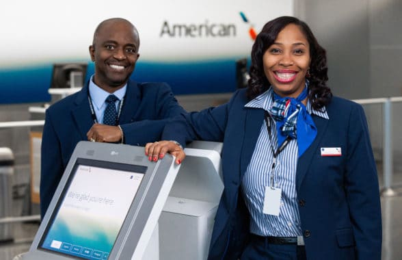 American Airlines check-in desk with check-in staff