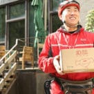 JD.com courier delivering goods bought with digital yuan