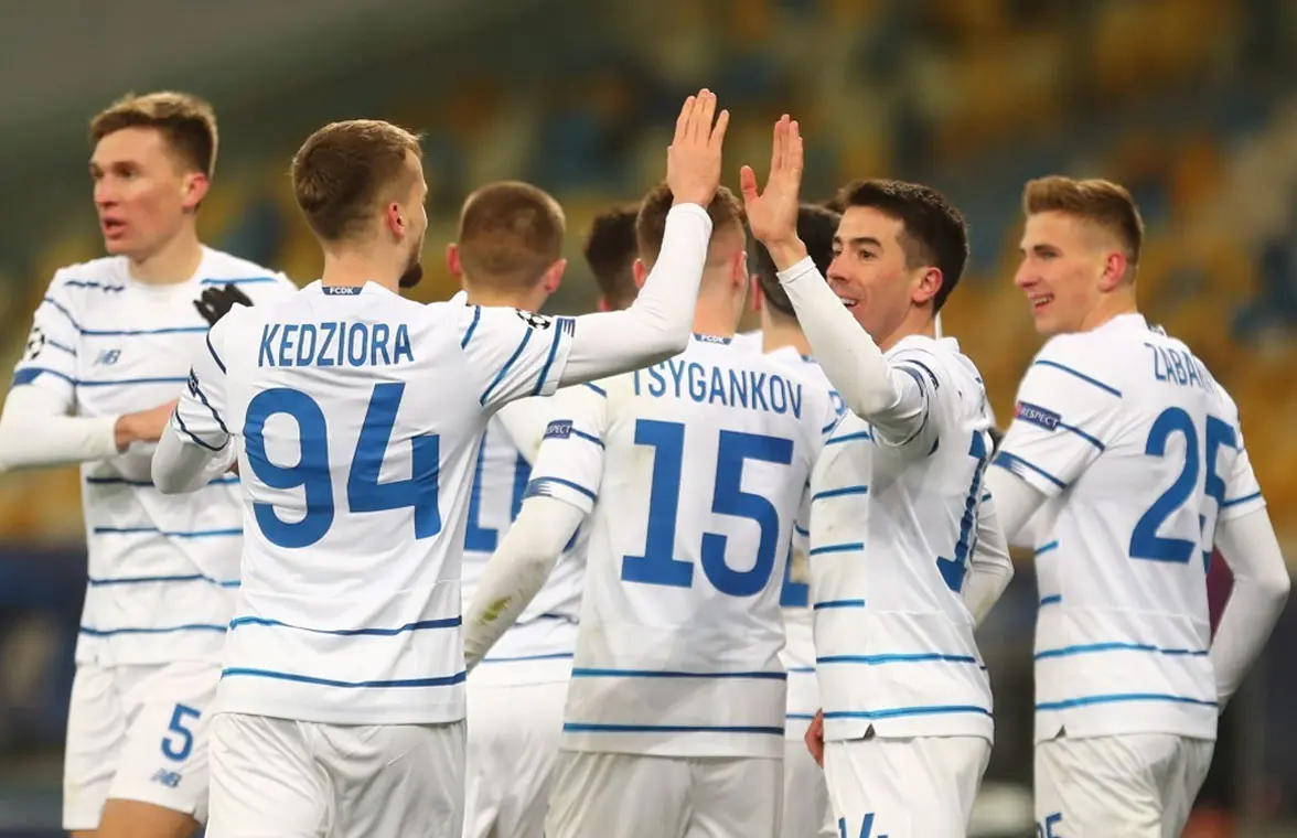 Dynamo Kyiv football players wearing 2020 home strip