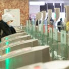 Passenger uses Moscow Metro contactless access gates