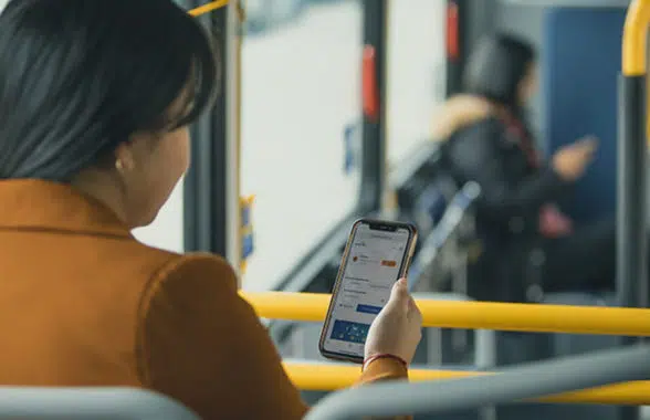 Translink Transit app on woman's phone