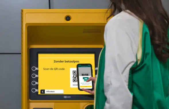 Woman making cardless ATM withdrawal using ABN Amro mobile banking app