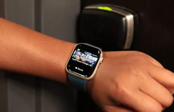 Apple Watch with Apple digital room key being used to  unlock room at Hyatt hotel