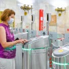woman using virtual Troika transit card on Moscow Metro
