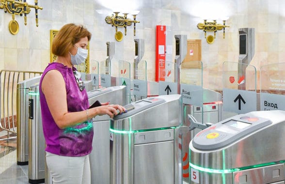 woman using virtual Troika transit card on Moscow Metro