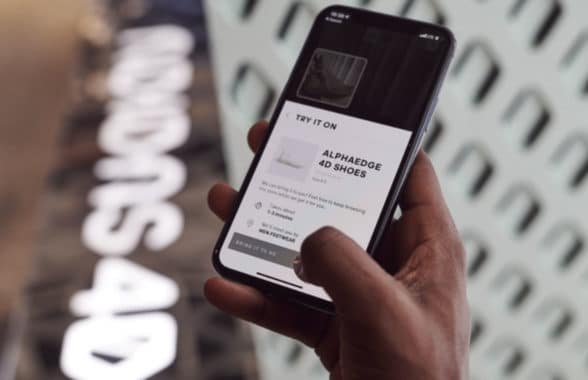 Adidas contactless in-store shopping app on a phone in the Philippines