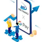 2 men shaking hands in front of phone advertising Google Pay and DMI Finance India in-app personal loans