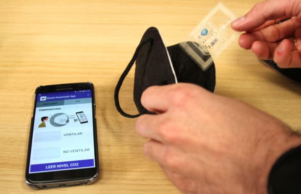 Smart facemask with NFC sensor that alert wearers to high carbon dioxide levels via a smartphone app 