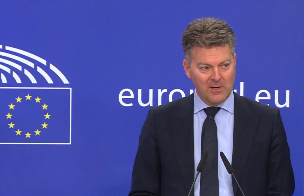 EU spokesperson Andreas Schwab speaking in front of EU stars logo