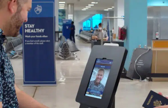 Cruise passenger using Holland America Line mBark face recognition check in