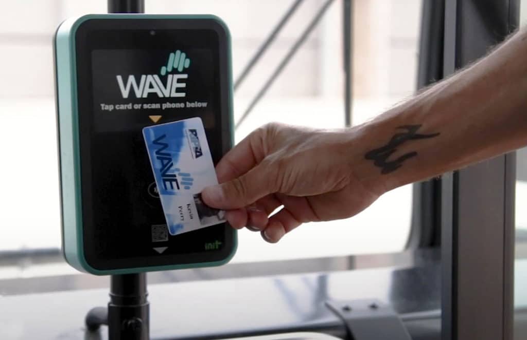 Rhode Island Wave transit card being tapped for geofenced free contactless ticketing 