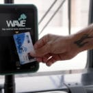 Rhode Island Wave transit card being tapped for geofenced free contactless ticketing
