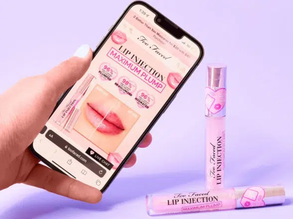 Too Faced cosmetics product samples with NFC tags and smartphone to drive customer engagement