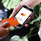 Card making contactless payment on software-only POS on smartphone in Dutch department store
