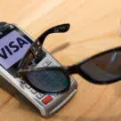 Smart glasses being used to make NFC payment on a Visa deviceeed to support NFC tag reading