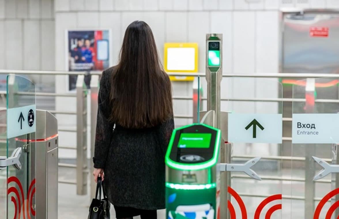 Woman on Moscow Metro using face biometric ticketing 