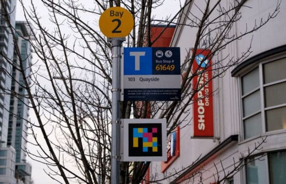 Navilens code for wayfinding for visually impaired transit users at a bus stop in Vancouver