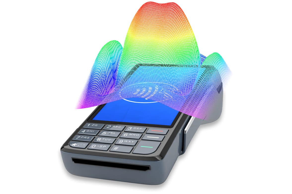 An artist's impression showing an RF field superimposed over a POS terminal