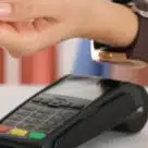 Mobile wallet on smartwatch being used to make contactless payment in Egypt